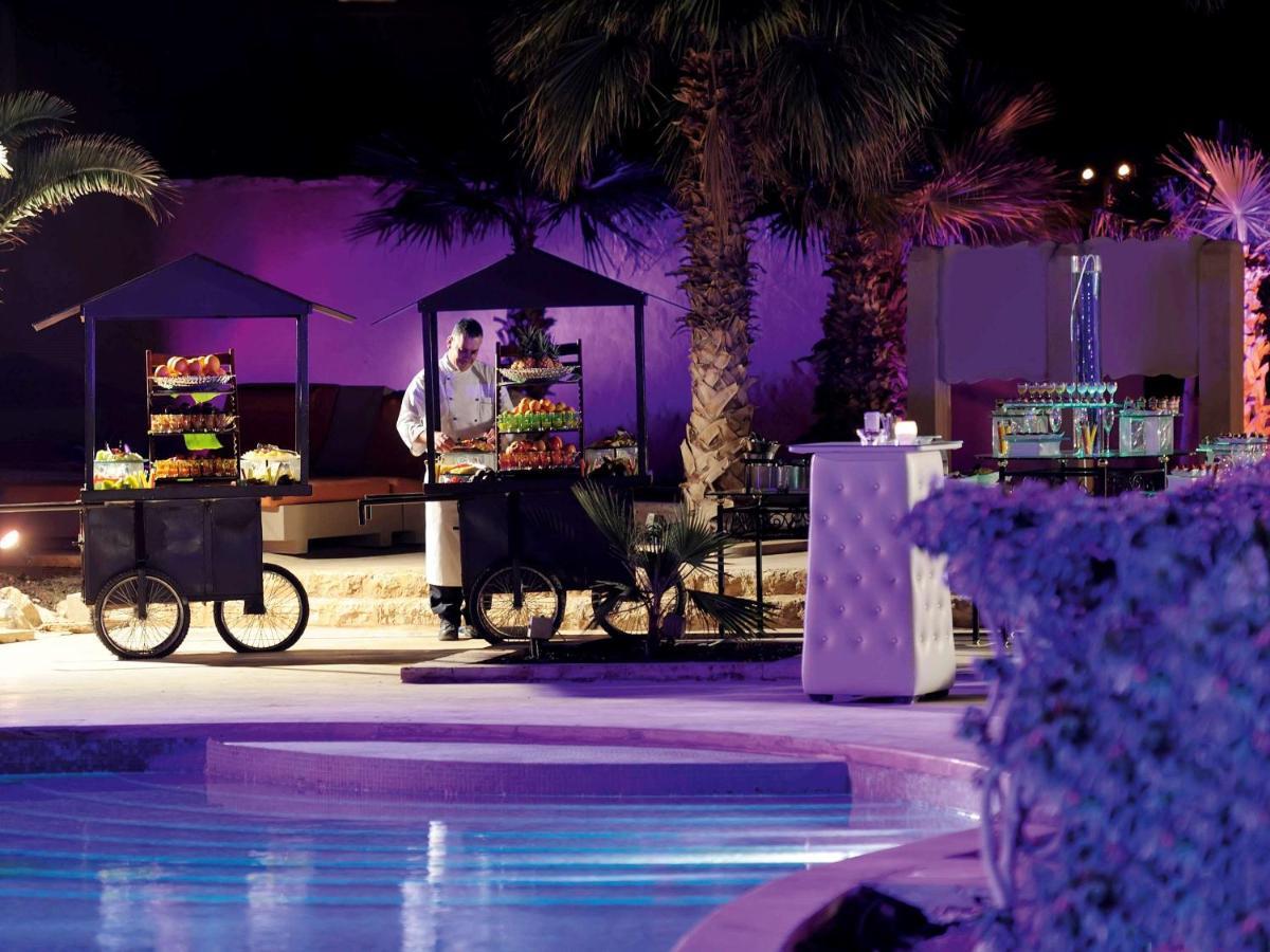 Moevenpick Resort & Spa Dead Sea Sweimeh Luaran gambar Poolside at the Ritz-Carlton, Dubai